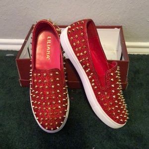 Red and gold spiked flats